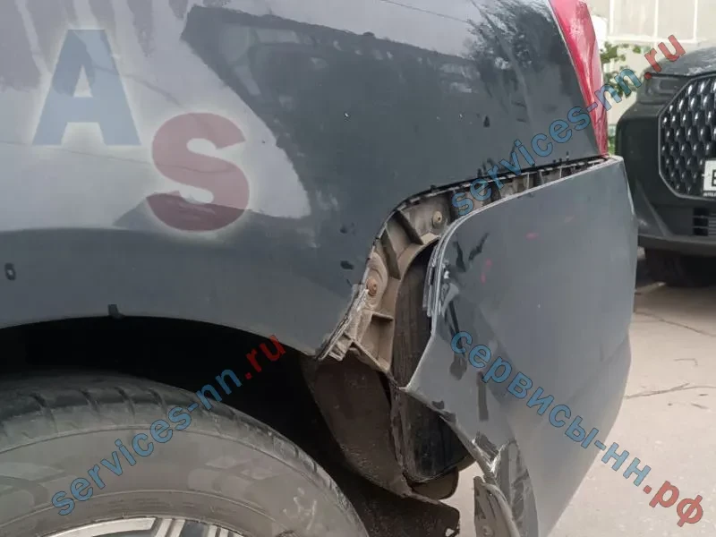Повреждения заднего бампера